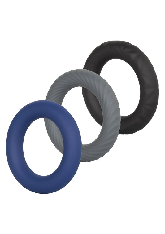 Cockring-set met drie ronde ringen in donkerblauw, grijs en zwart, gestapeld.