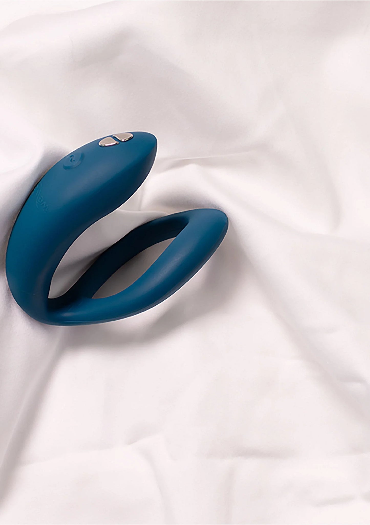 Blauwe O-vormige siliconen ringvibrator opgevouwen