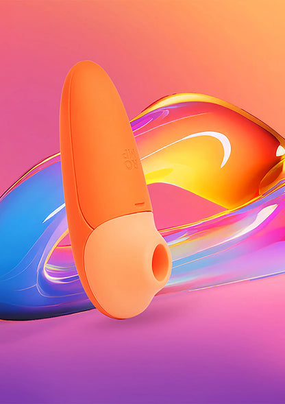 Oranje stimulatieapparaat met afgeronde kop, in grafische 3D-weergave
