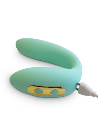 Lichtgroene U-vormige vibrator met gele bedienknoppen en witte kabelstekker.