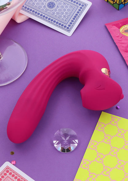 Roze U-vibrator met gebogen vorm en gouden inzet, schuin bovenaanzicht.