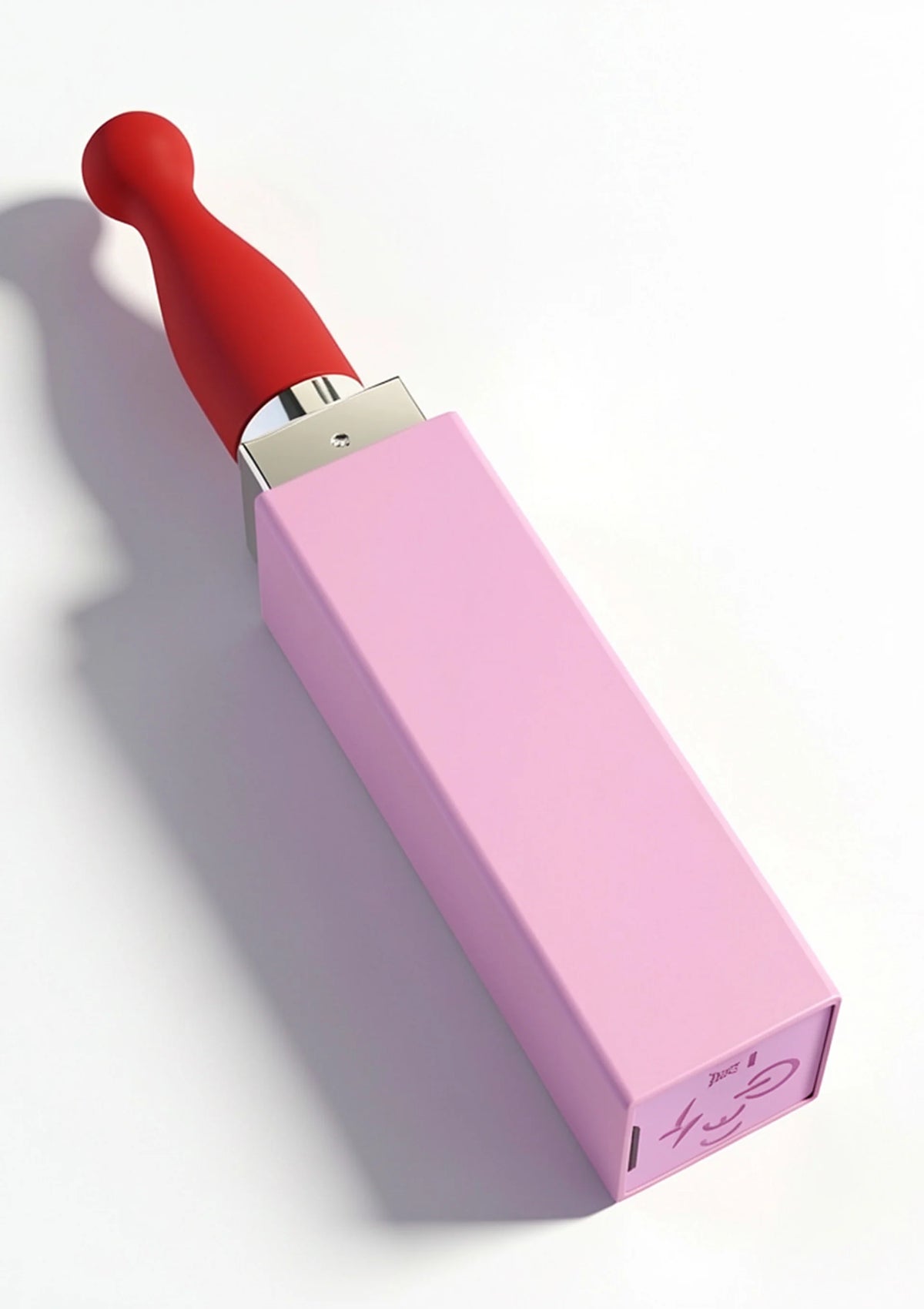 Lipstick-vibrator van Xocoon met rood opzetstuk en roze verpakking in zijaanzicht
