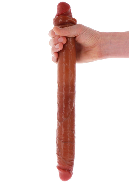 Bruine siliconen dubbele dildo, in hand geknepen, top met gebogen uiteinde