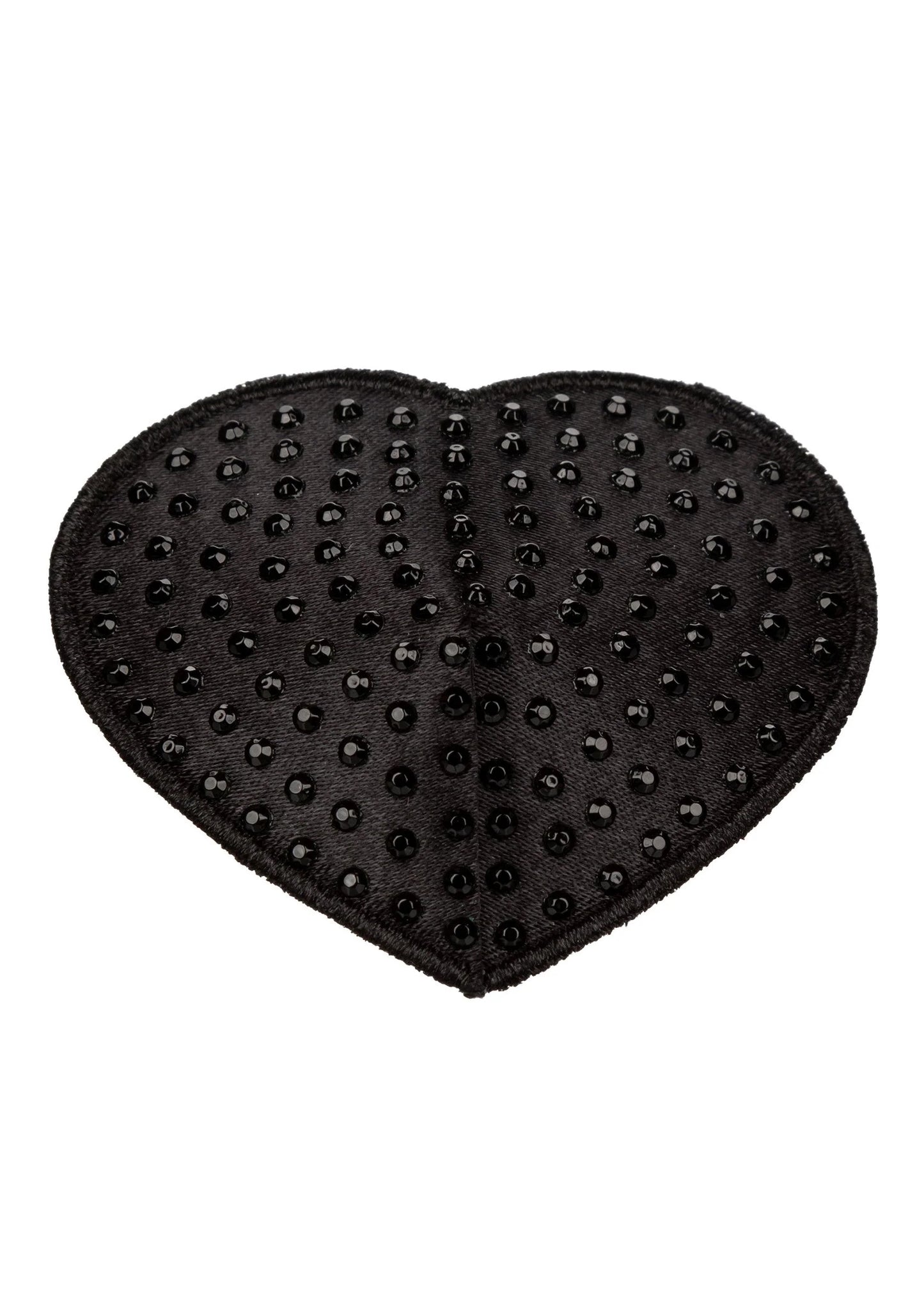 Hartvormige zwarte pasty met kleine noppen, close-up op het hartpatroon