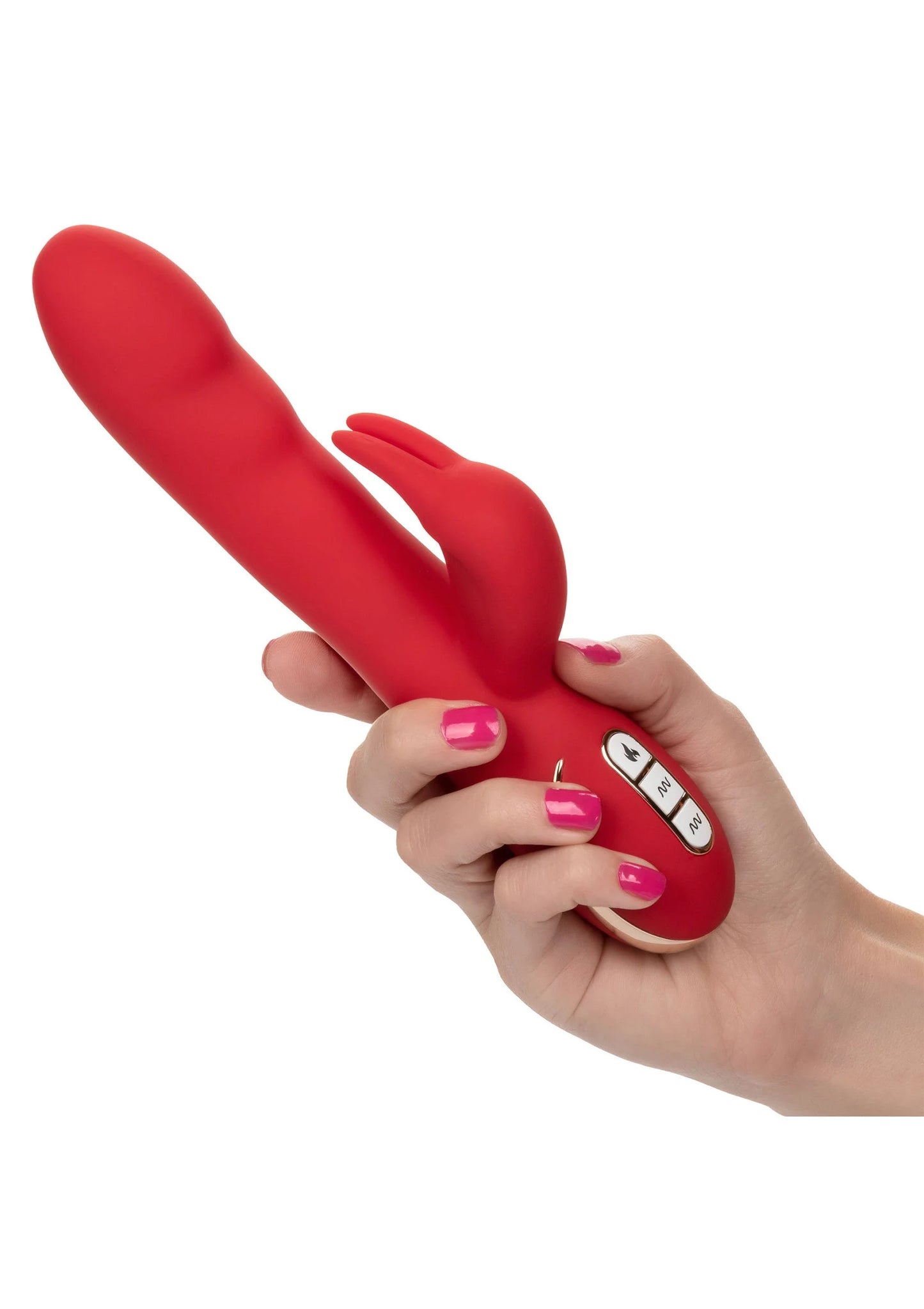 Rode verwarmde siliconen konijn-vibrator in hand met zichtbare bedieningsknop.