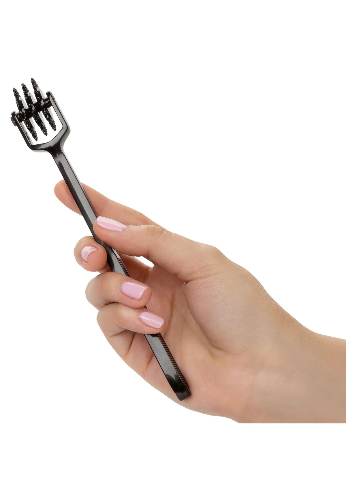 Hand met zwarte plezierwielkop en lange steel met pinnen