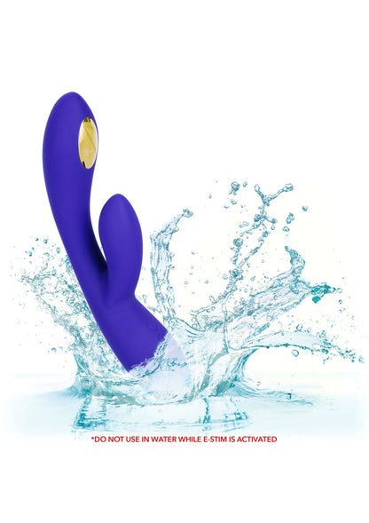 Paarse E-stimulator dual wand met spatten water rondom