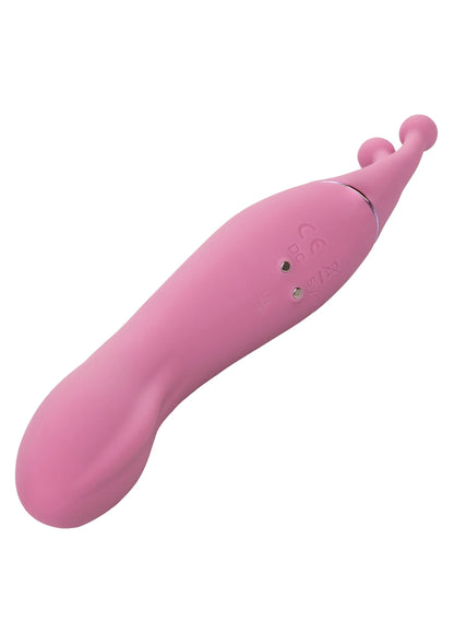 Roze dual-sided massager vibrator met detail op bedieningsgedeelte; gladde finish.