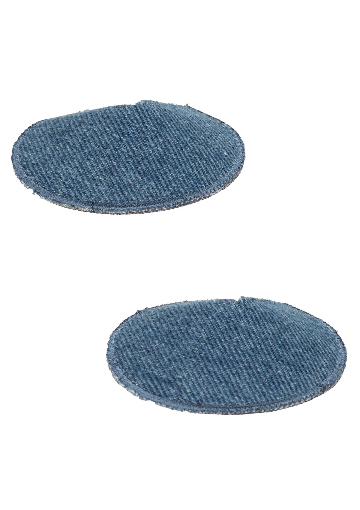 Twee ronde denim pasties, donkerblauw, met zachte, afgeronde randen