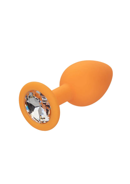 Oranje anale plug met ronde kristal-inzet en brede flens, 3-delige set-look.