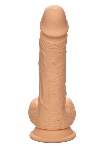 Bruine siliconen dildo staand met stevige basis en afgeronde kop, vooraanzicht