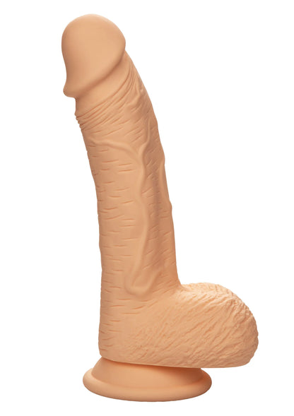 Bruine siliconen dildo met afgeronde kop en brede basis, schuin zijaanzicht