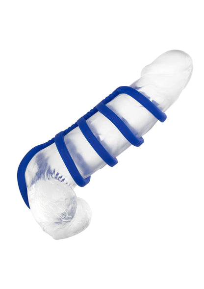 Blauwe siliconen cockkooi met multi-ringen op witte inzet.
