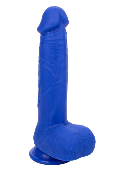 Blauwe vibrerende dildo in zijaanzicht, afgeronde basis met platte onderkant