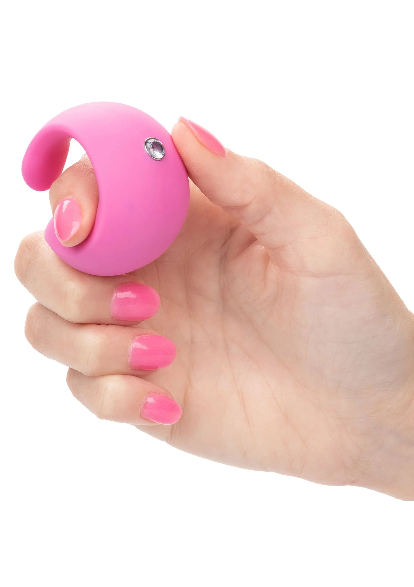 Roze siliconen vingervibrator in hand, met metalen ronde inzet op het bolle deel.