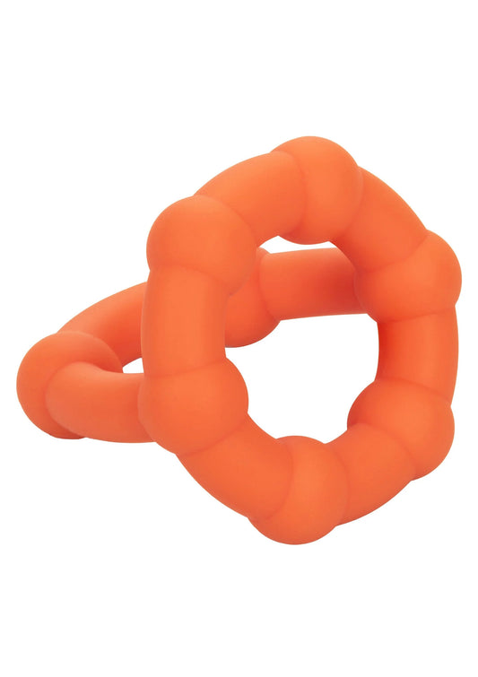 Oranje siliconen ring met ronde, kussenvormige buisjes en open midden