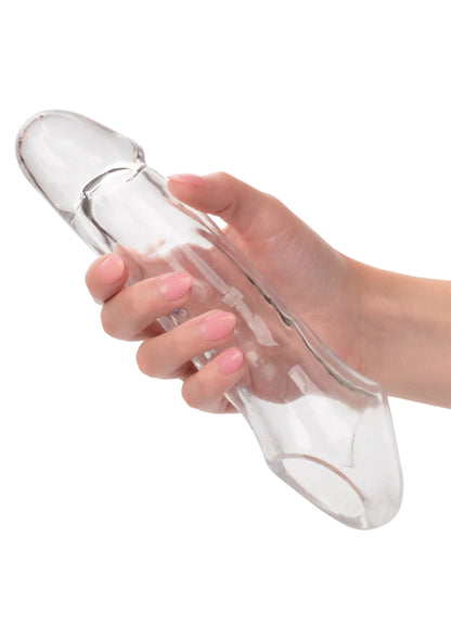 Transparante penisextender in hand, heldere glanzende afwerking en afgeronde uiteinden.