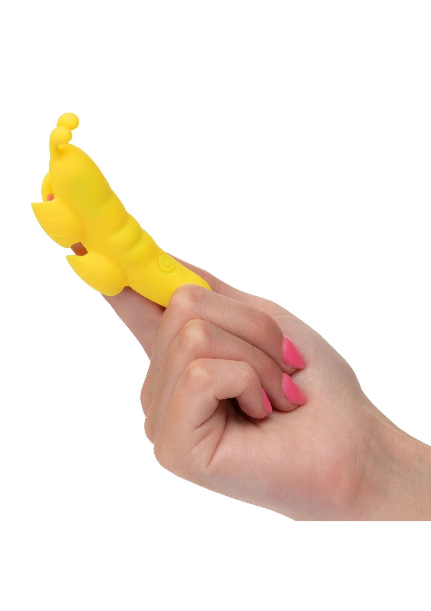 Gele vlinder-vormige vibrator, vastgehouden in een hand met roze nagellak.