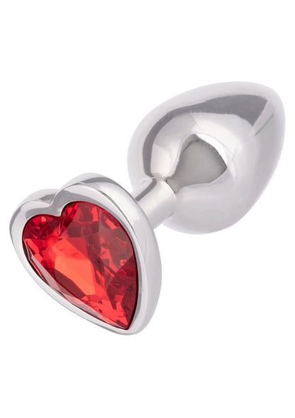 Zijaanzicht van zilverkleurige metalen anale plug met rood hartvormig inzetstuk