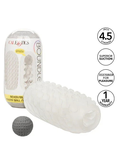 Witte stroker met reliëfstructuur en grijze squishy bal