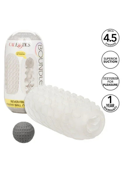 Witte stroker met reliëfstructuur en grijze squishy bal