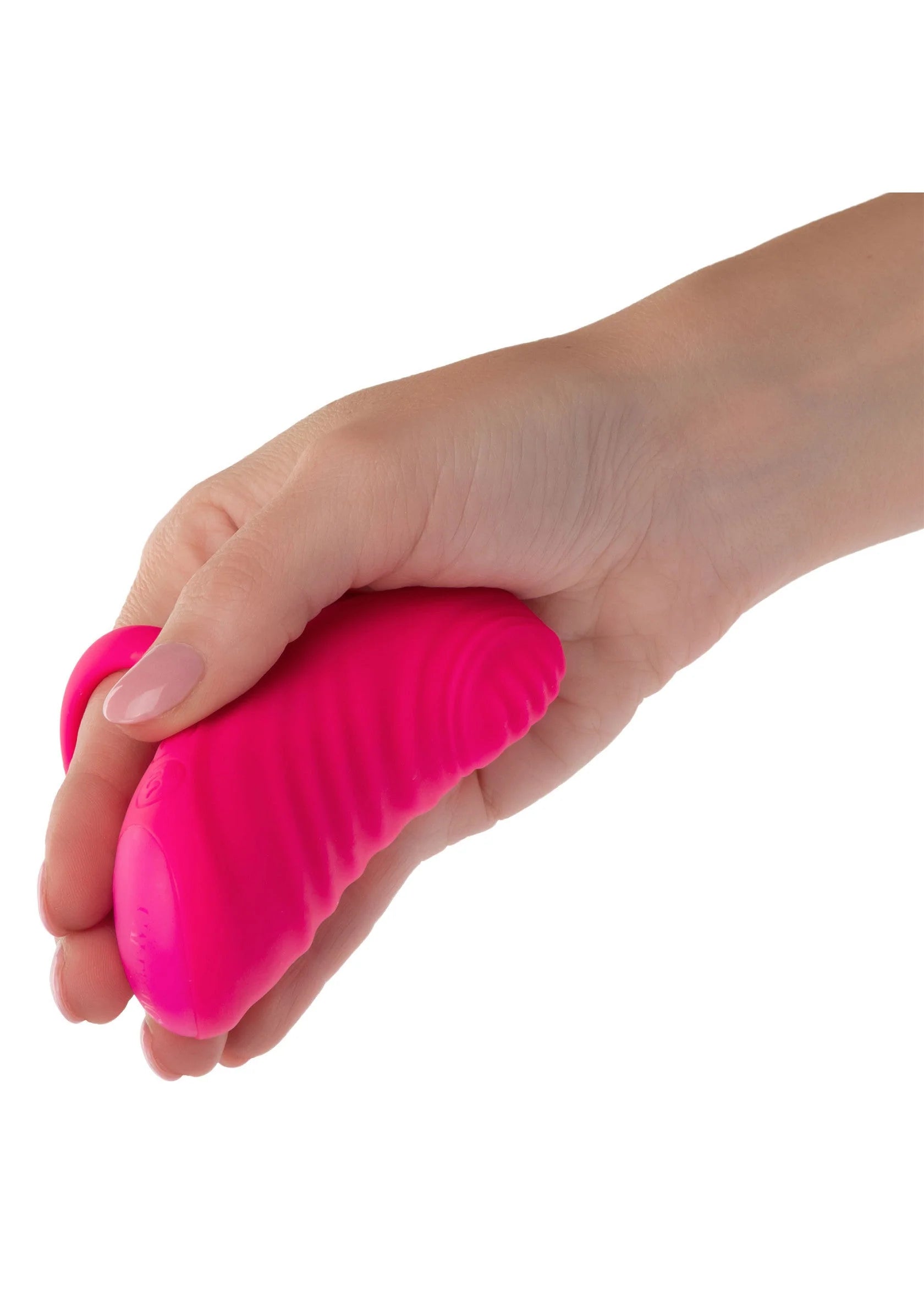 Roze massagevibrator in hand, met ringvormige greep en brede kop