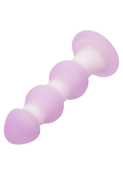 Lila siliconen beaded probe, close-up van afgeronde segmenten en brede basis