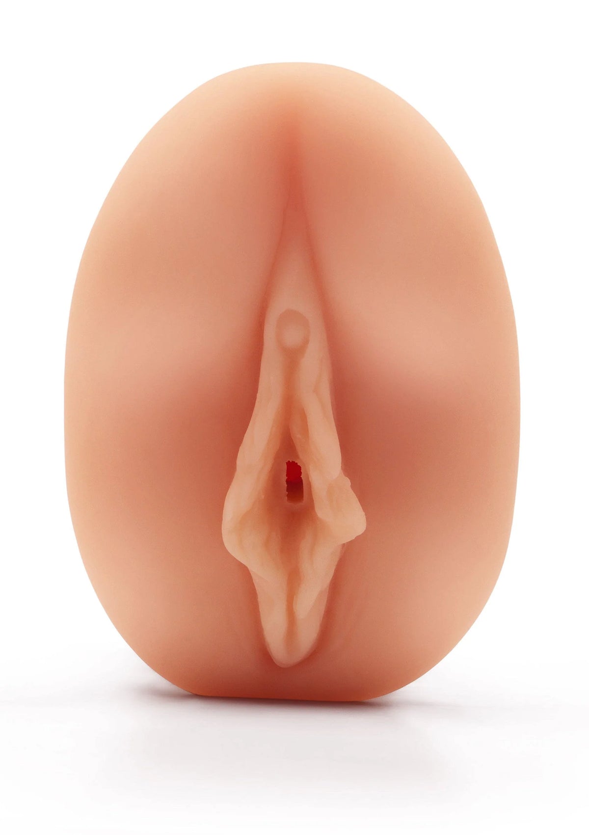 Kunstmatige masturbator met ovale voorzijde en roodachtige opening.