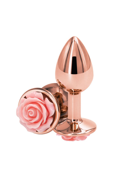 Kleine rozenbuttplug van NS Novelties, rose-goudkleurige plug met roze roosbloem
