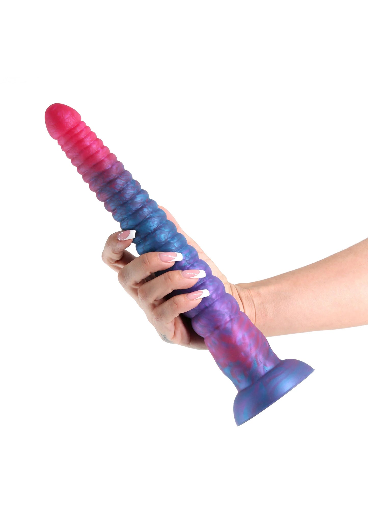 Meer-kleurige dildo met ronde kop en brede voet, vastgehouden in de hand