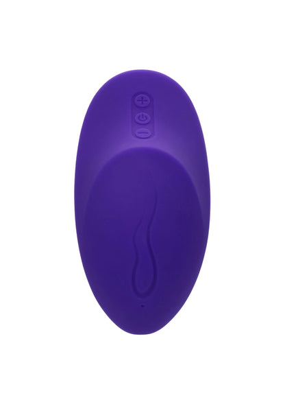 Paarse silicone glijmassager met ovale contour en knoppen op de achterzijde