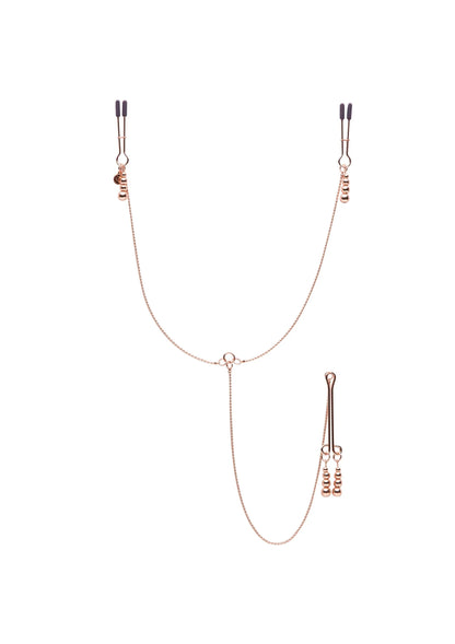 Roze-gouden ketting met twee klemmen en centrale ring, met verlengkettingen