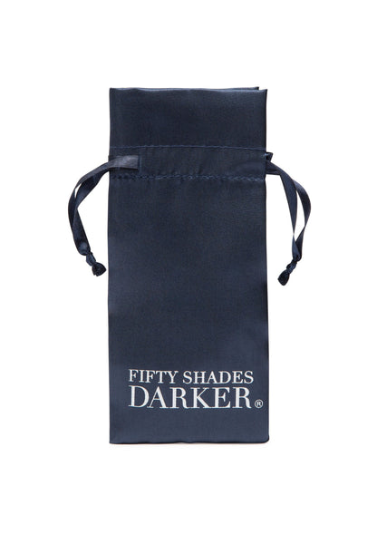 Donkerblauw opbergzakje met trekkoorden en Fifty Shades Darker merk op voorzijde