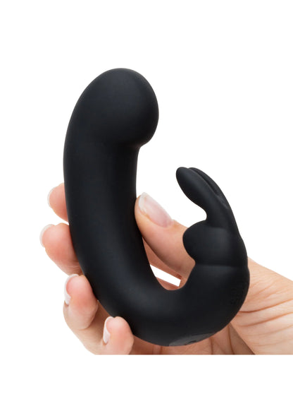 Zwarte oplaadbare rabbit vibrator vastgehouden in de hand