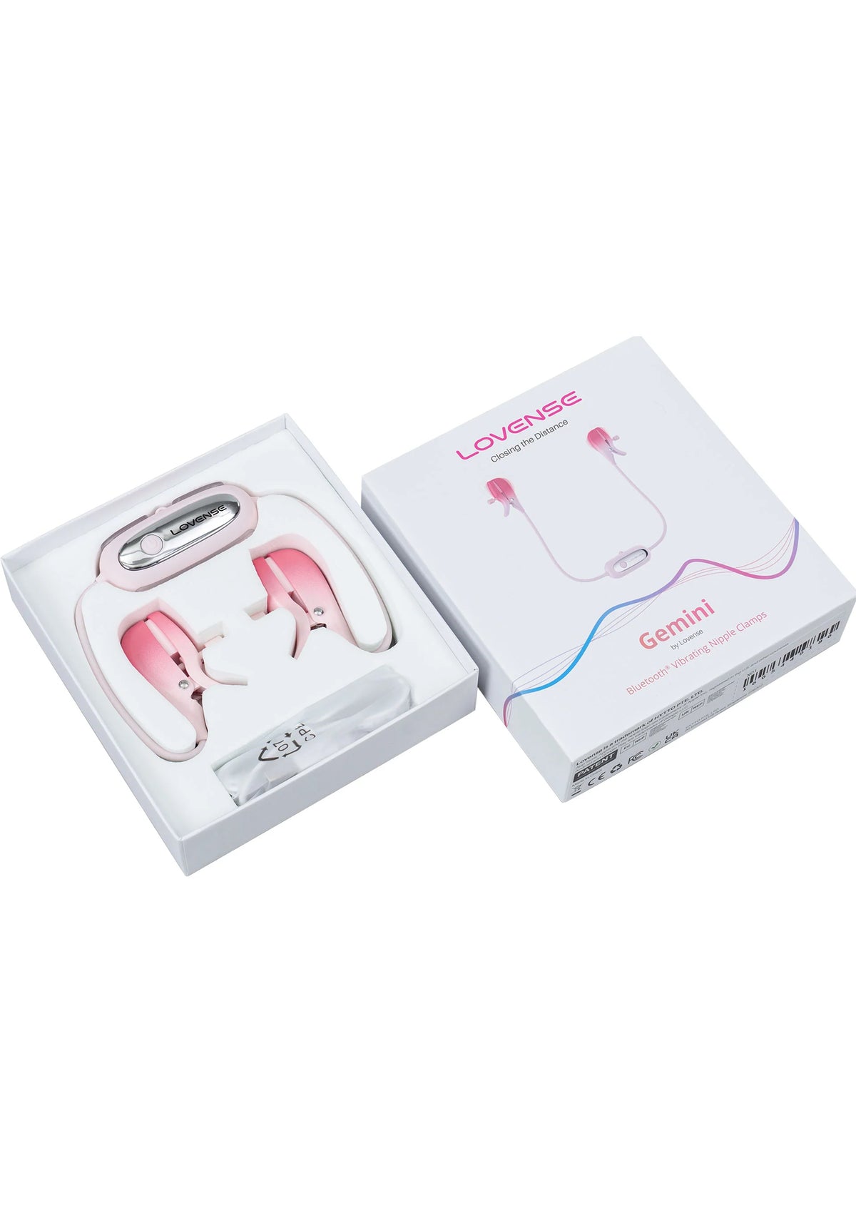 Roze nippelklemmen set in verpakking met zichtbare onderdelen