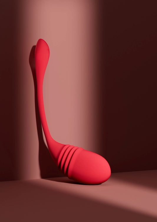 Rode G-spot vibrator met afgeronde punt en geribbelde grip.