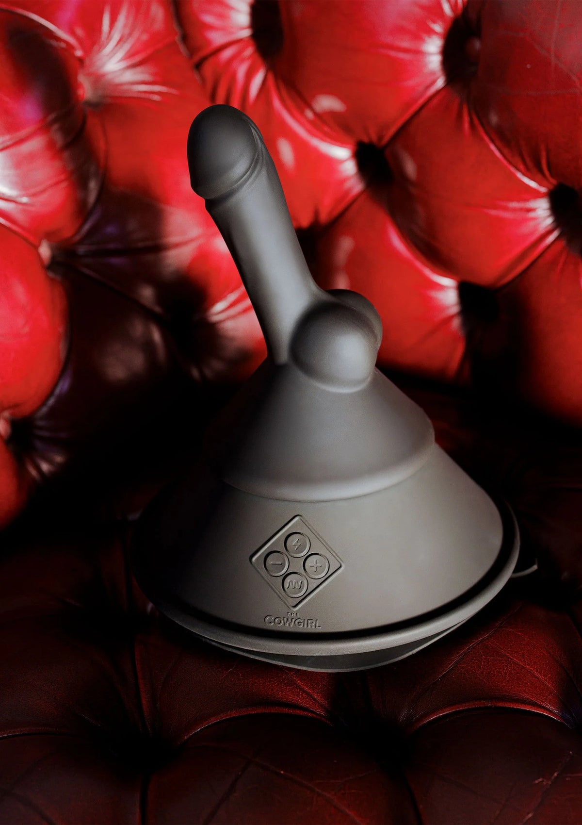 Grijze kegelvormige sekstool met twee opzetstukken, detail van ronde basis