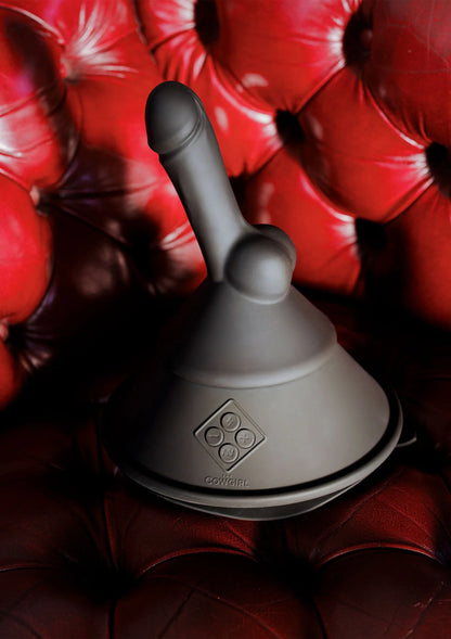 Grijze kegelvormige sekstool met twee opzetstukken, detail van ronde basis