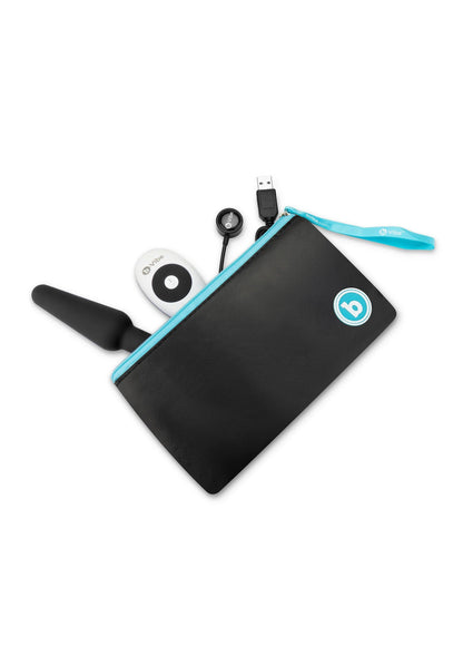 Zwarte draagetui-kit met anaale plug, controller en kabel