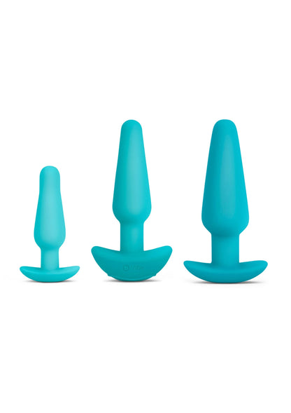 Turquoise anale plugset met drie maten, elk met brede basis