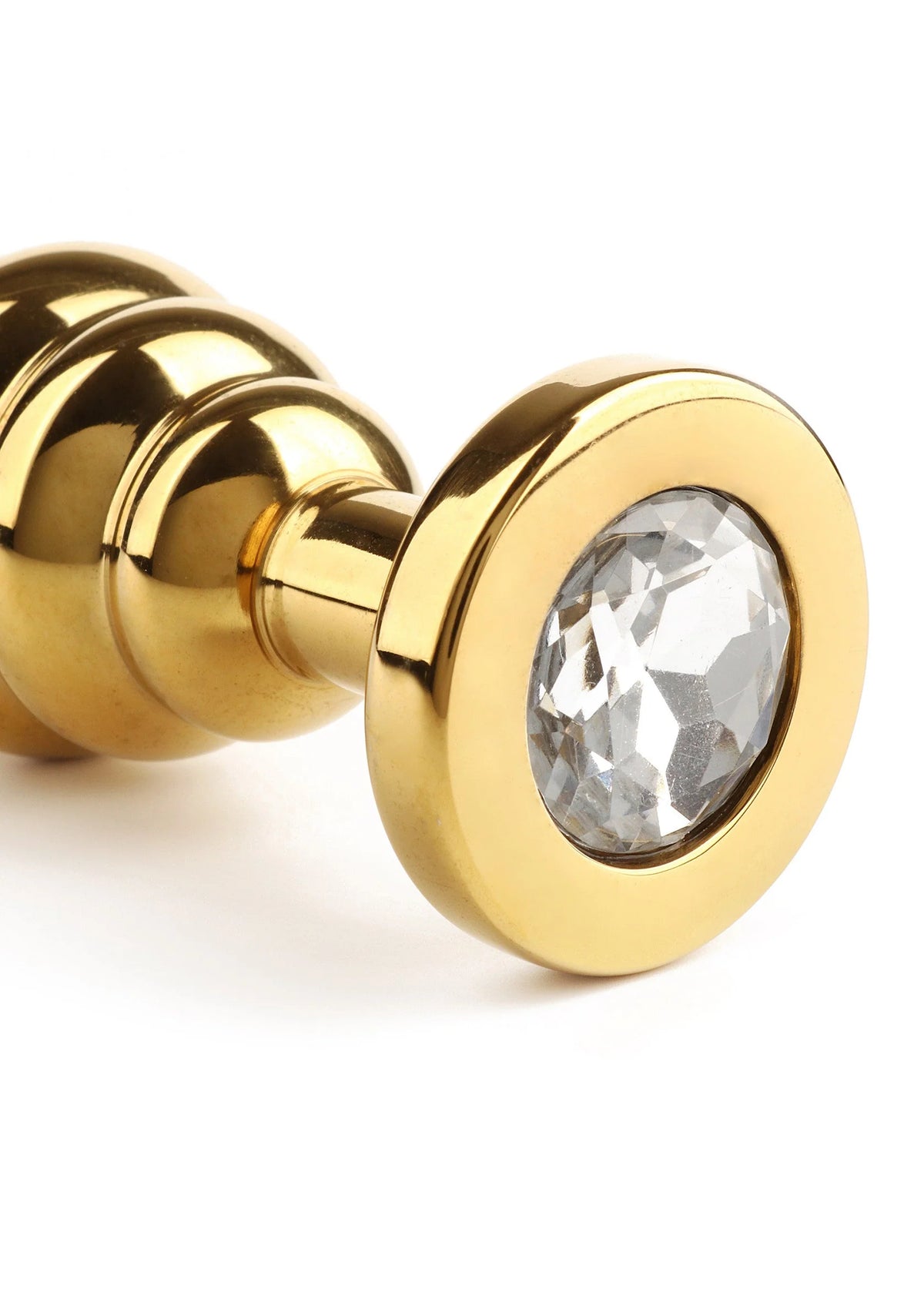 Gouden Mr. Steel twister-buttplug met ronde glaskraal aan voorkant