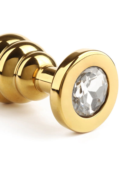 Gouden Mr. Steel twister-buttplug met ronde glaskraal aan voorkant