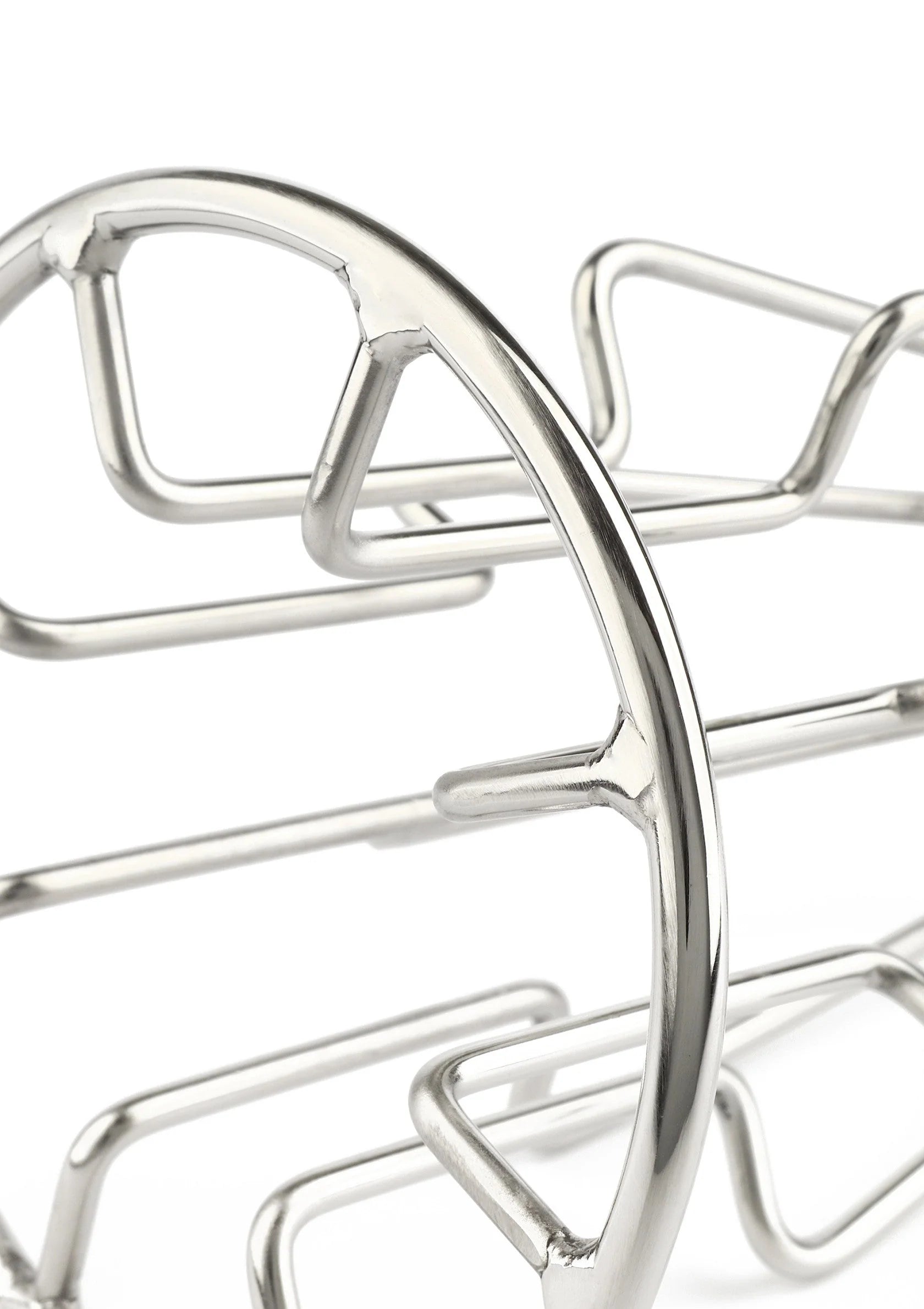 Trapeziumvormige metalen anaalplug met afgeronde randen en kruisende stangen