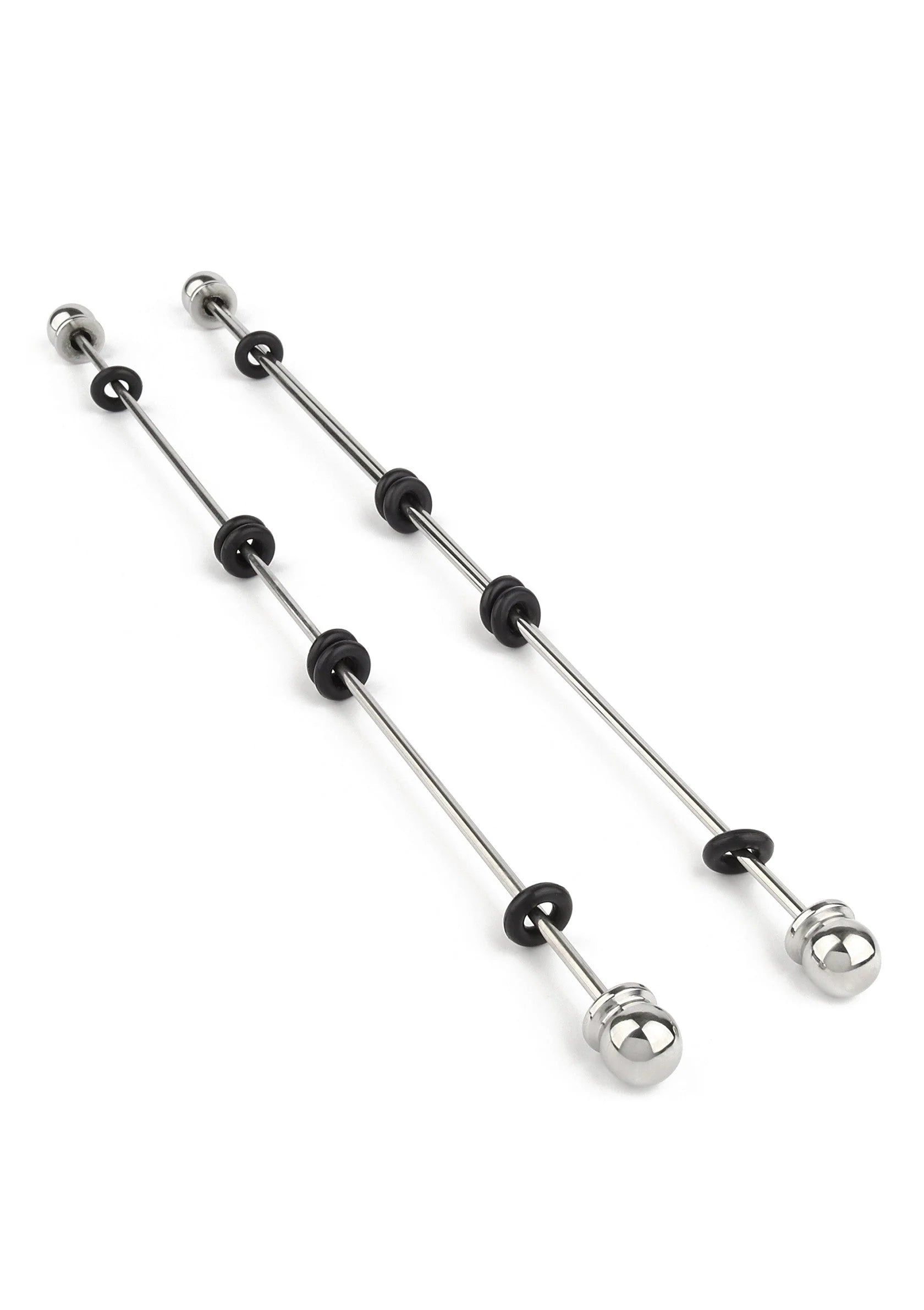 Nipple sticks met ballen: paar zilverkleurige staven met zwarte ringen en glanzende boluiteinden