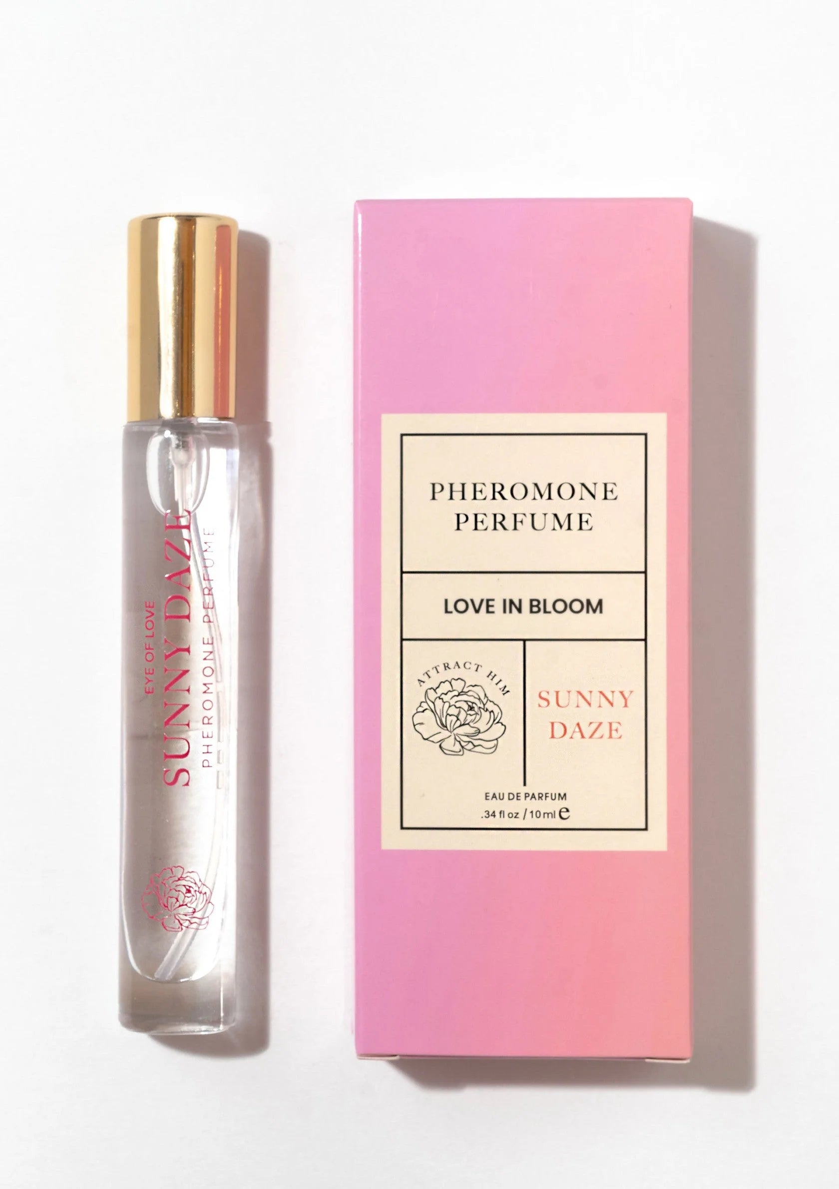 Sunny Daze parfumflesje met gouden verstuiver en roze doos met label.