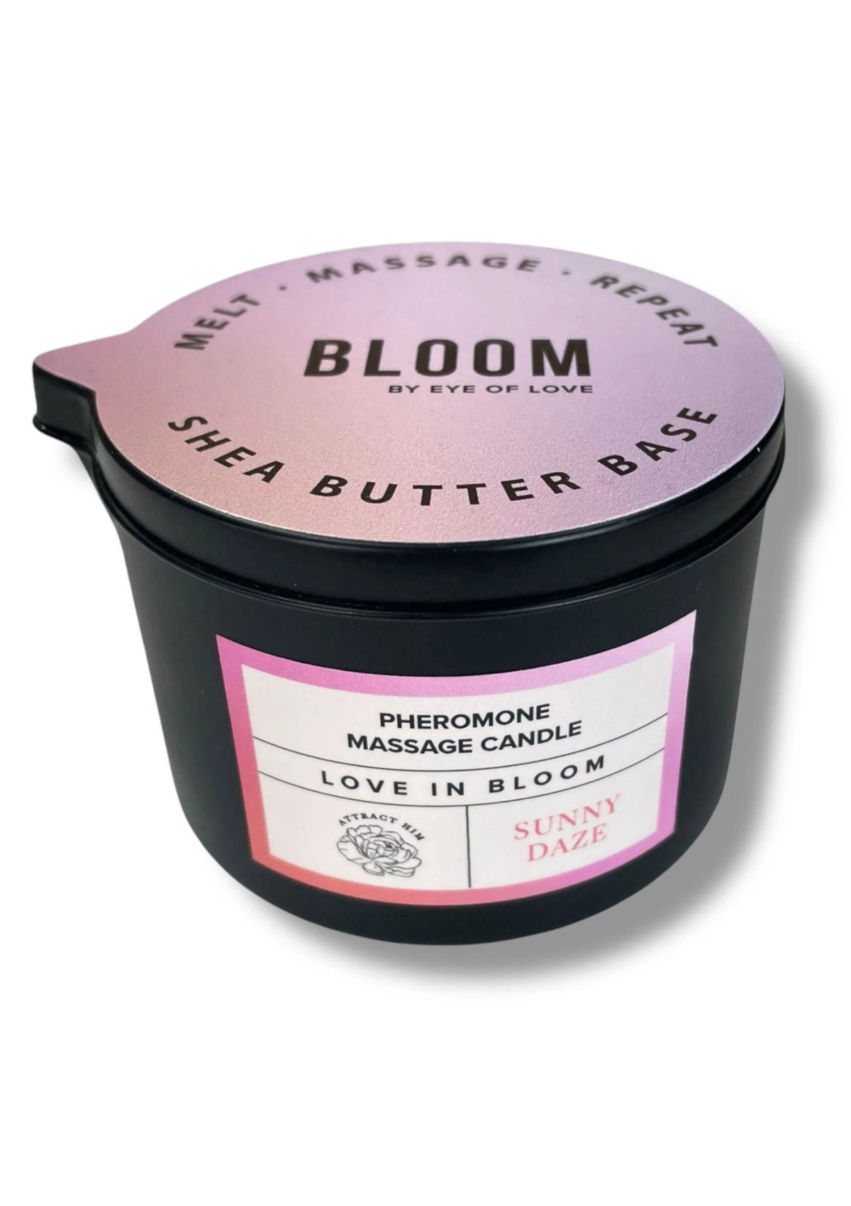 Zwarte massagekaars met etiket Lilac Dream en ronde bovenkant, open deksel.