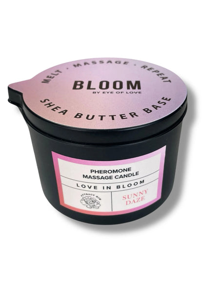 Zwarte massagekaars met etiket Lilac Dream en ronde bovenkant, open deksel.