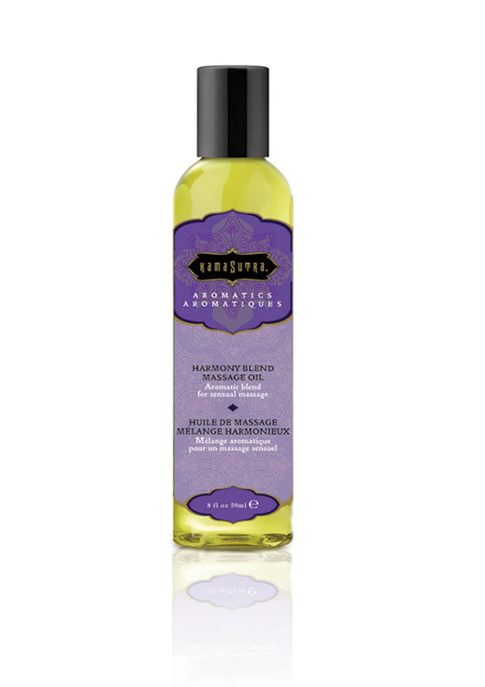 Massageolie van Kamastrutra, groene fles met zwarte dop en paarse Harmony Blend-label
