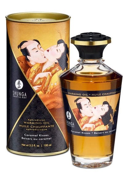 Shunga verwarmingsolie Caramel Kisses, goudbruin blik en amberkleurige fles, 100 ml.
