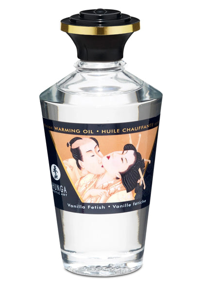 Shunga verwarmende olie Vanilla Fetish: doorzichtige fles met zwarte dop